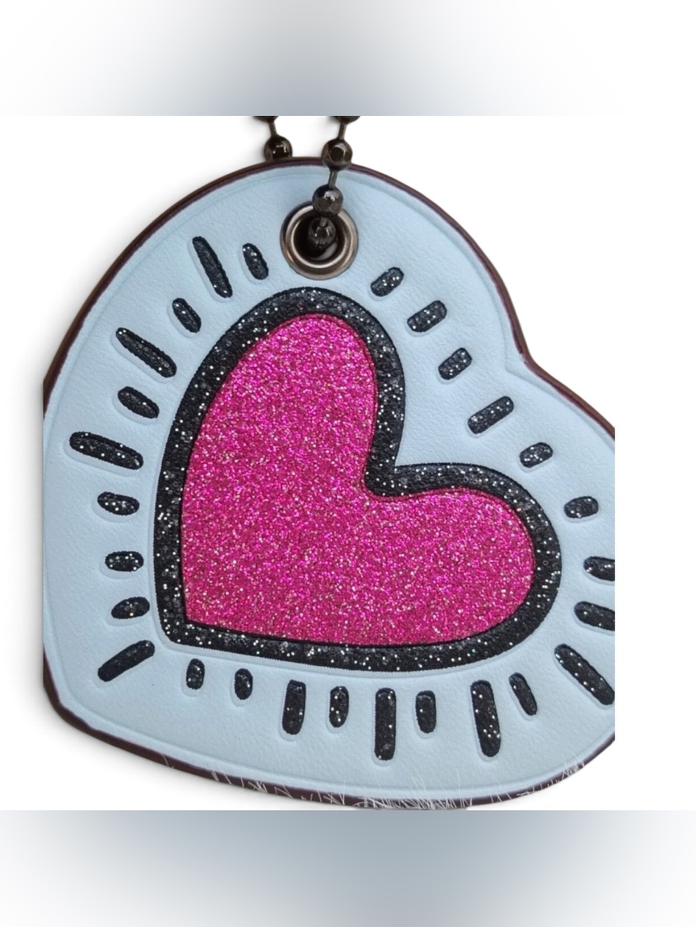 Coming soon Coach x Keith Haring glitter, heart bag charm